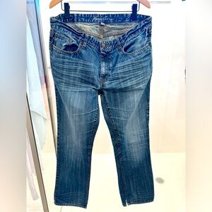 Men’s Kenneth Cole jeans. 1” cut at bottom opening. 36x34